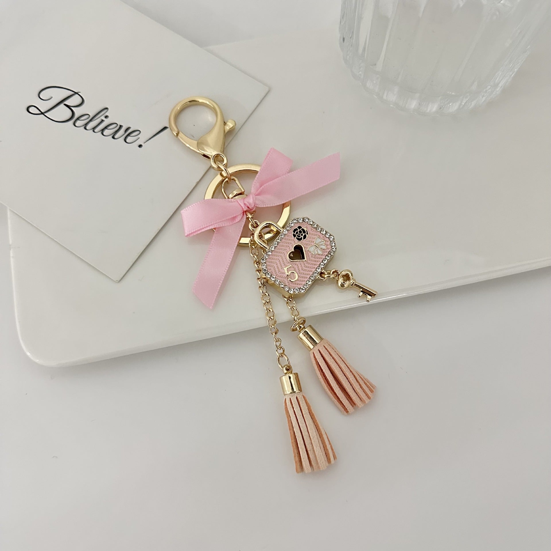 Wholesale Zirconia Bow Metal Tassel Keychain